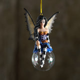 Fairy ornament, black hair, purple and orange outfit with black and white striped sleeves & stockings, tan and black wings, perched on glass bubble