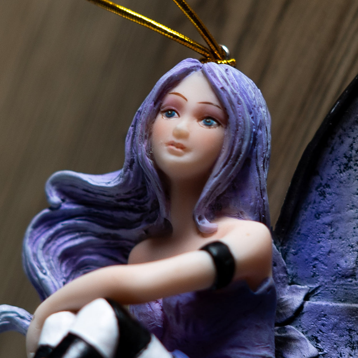 Closeup of fairy, purple hair, blue eyes