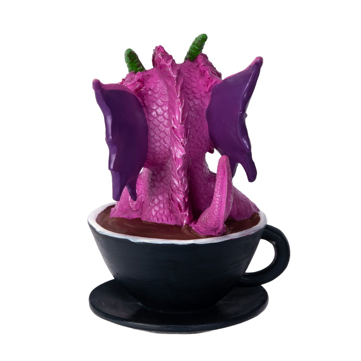 Pink dragon figurine inside a black coffee cup, shown from the back