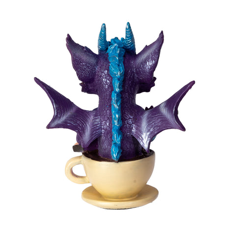 Dragon figurine on a coffee cup, shown from the back