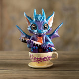 Dragon figurine on a coffee cup with "Espresso" written on it