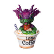 Dragon figurine sitting in an 'Iced Coffee' cup with a straw on a white background