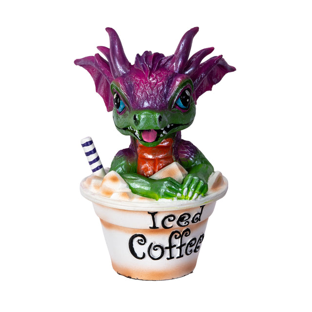 Dragon figurine sitting in an 'Iced Coffee' cup with a straw on a white background
