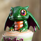 Green dragon figurine with colorful eyes 
