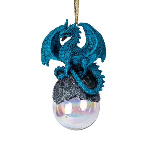Blue dragon ornament on rock on glass orb