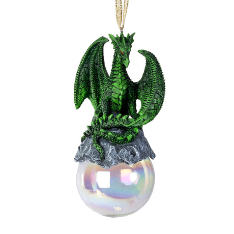 Green dragon ornament on rocks on a glass orb