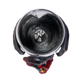 Glass goblet with red, black and gold dragon holding sword, shown top down