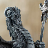 Closeup of gray dragon holding sword