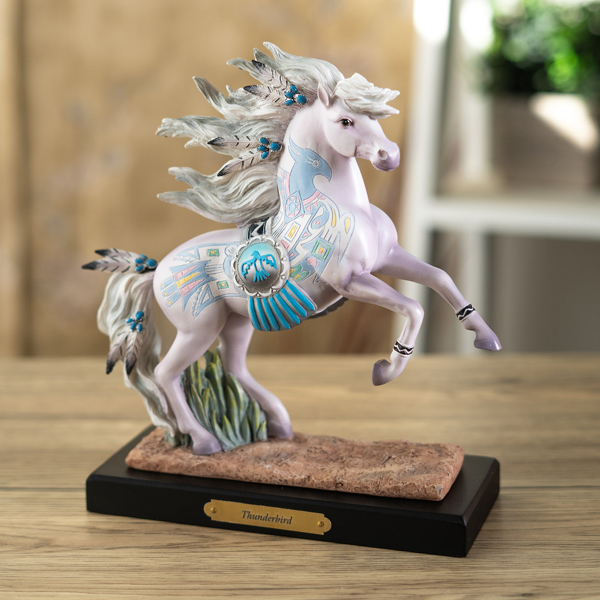 Horse figurine by Laurie Prindle with based labeled "Thunderbird" - white horse rearing with pastel Southwestern accents and feathers