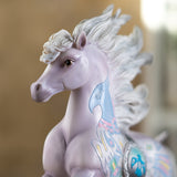 Closeup of horse figurine - pale horse with brown eyes, southwestern designs