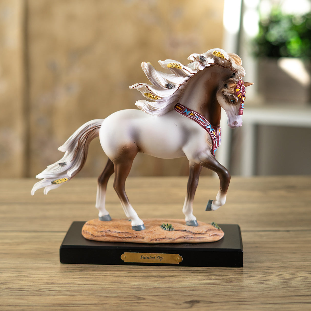 Horse figurine labeled "Painted Sky" - brown and white pinto with southwestern accents