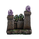 Decorative castle with dragon figurines, shown from the back