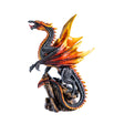 Dragon figurine with fiery orange and black colors, perched on a rock