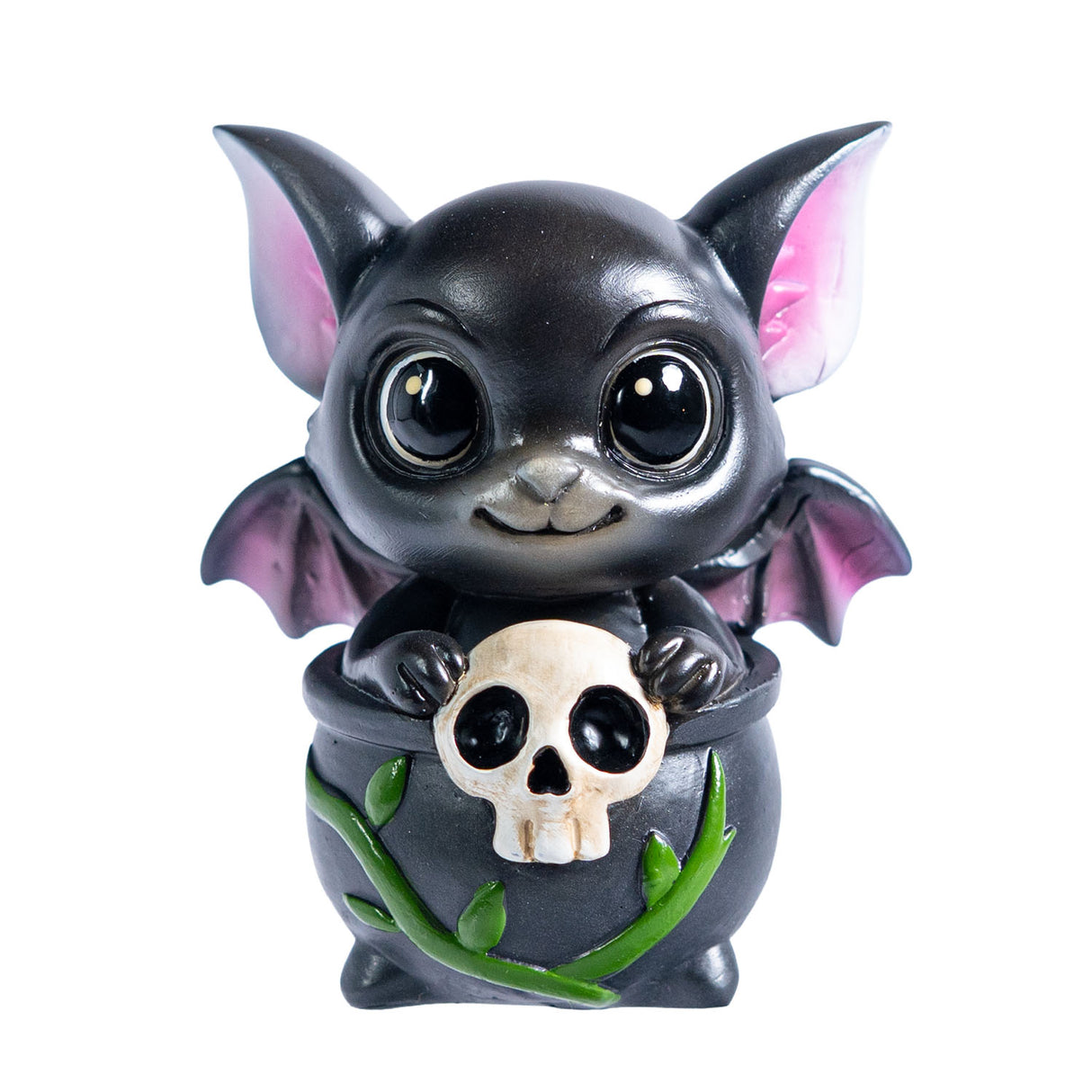 Small figurine of a black dragon imp with pink accents sitting in a cauldron with vines and a skull