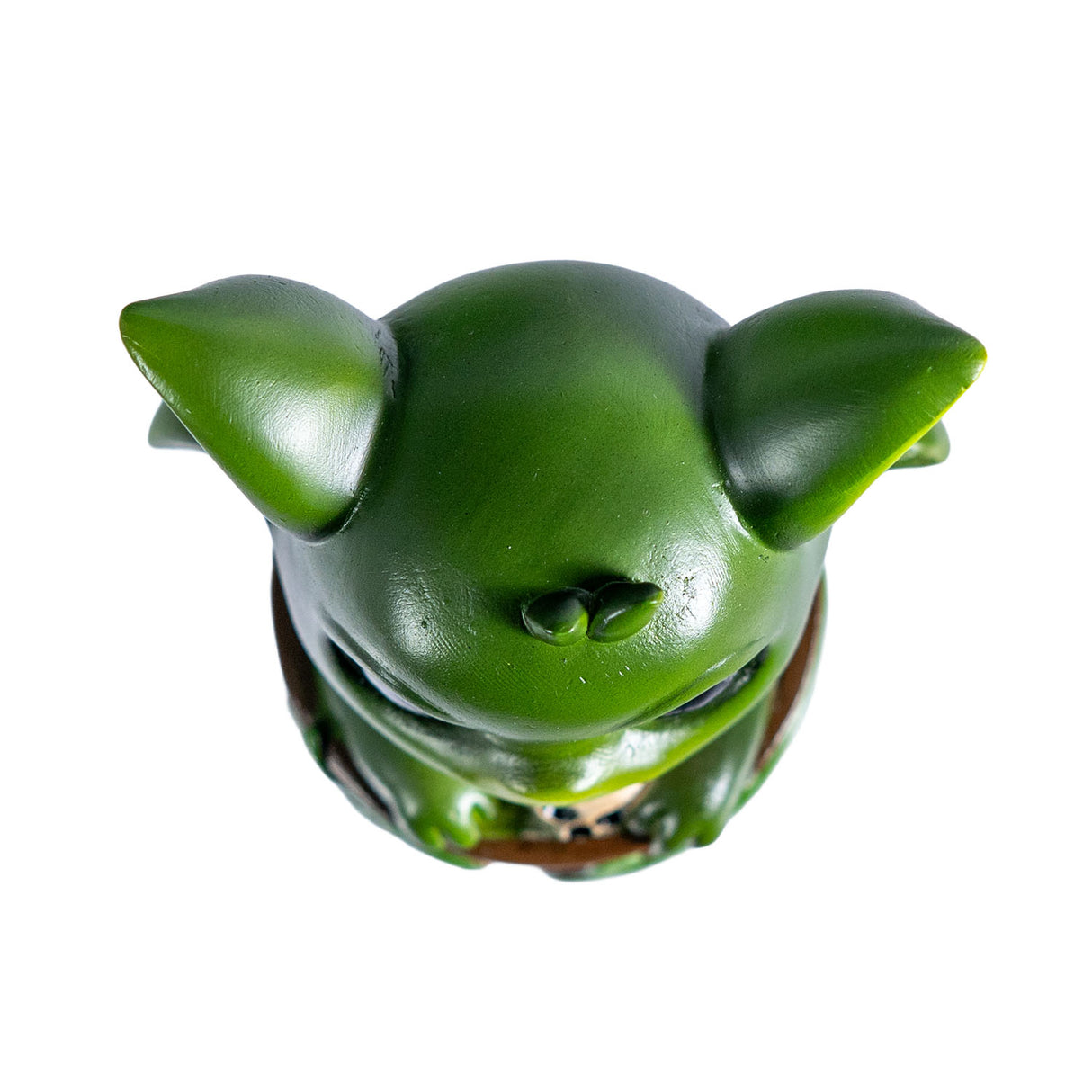 Green dragon-imp creature in a pot, shown top down