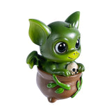 Green dragon-imp creature in a pot
