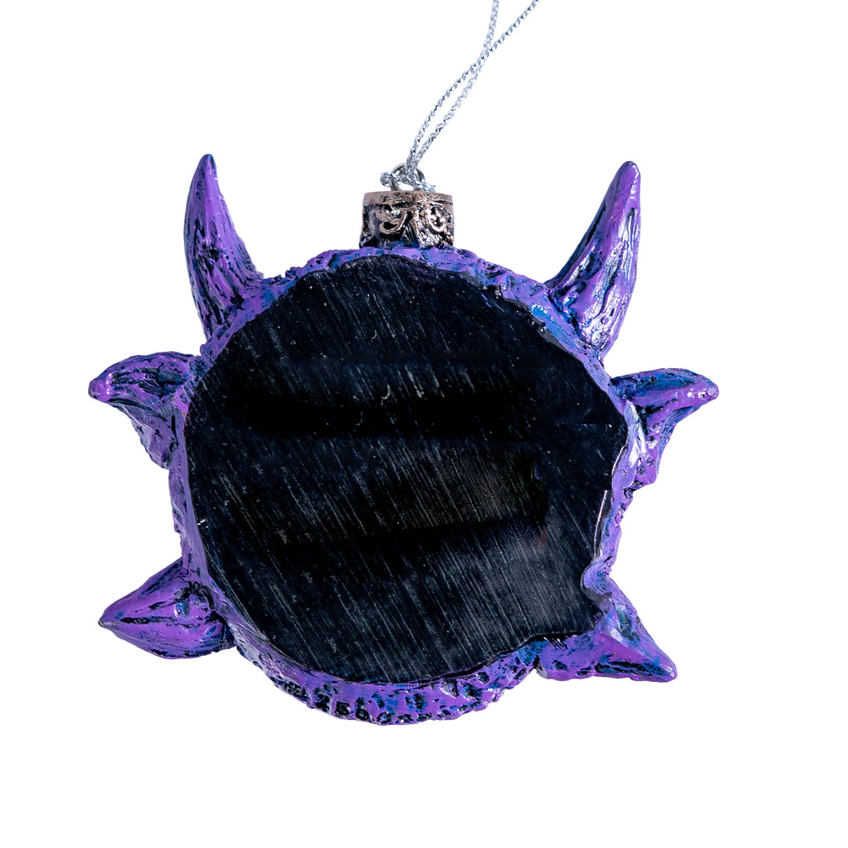 Ornament of a blue eye surrounded by purple scales and horns, shown from the back