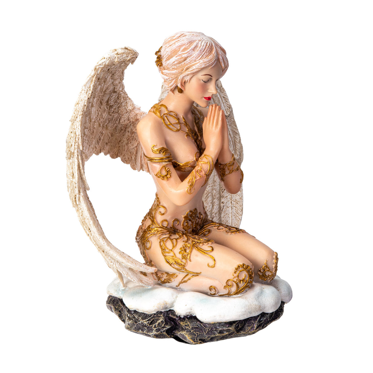 Figurine of a pale-haired angel praying in the snow with white feathered wings and golden swirl accents