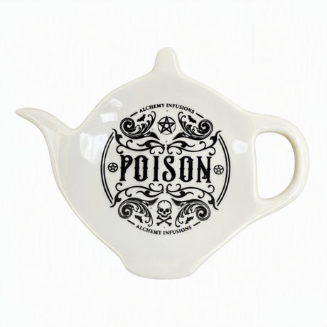 White ceramic teapot-shaped spoon rest with "Poison" motif and spooky designs