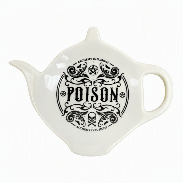 White ceramic teapot-shaped spoon rest with "Poison" motif and spooky designs