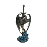 A decorative letter opener sword pierced through a skull with a dragon wrapped around and a crystal base, shown from the back