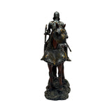 A detailed equestrian statue of a knight in full armor riding a horse. Shown head-on