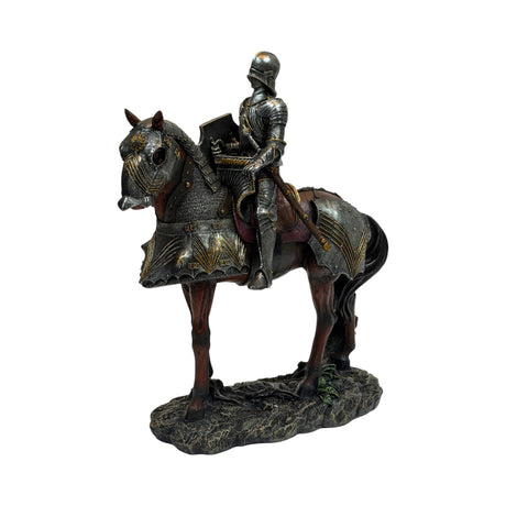 A detailed equestrian statue of a knight in full armor riding a horse, set against a plain white background.