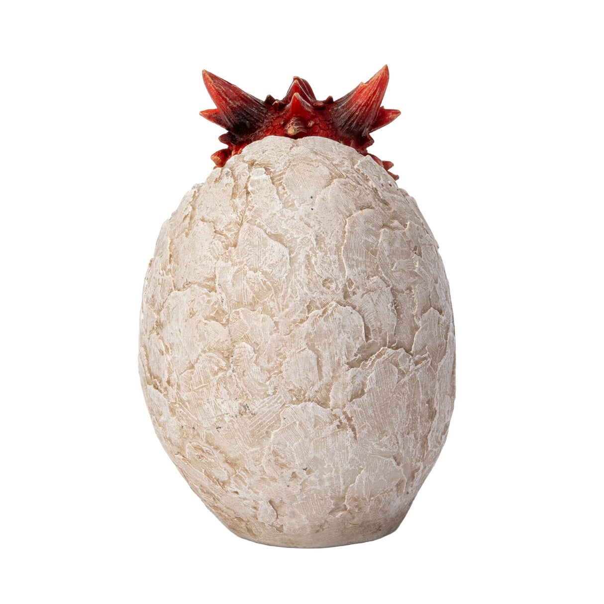 A small red dragon figurine sitting inside a cracked stone egg, shown from the back