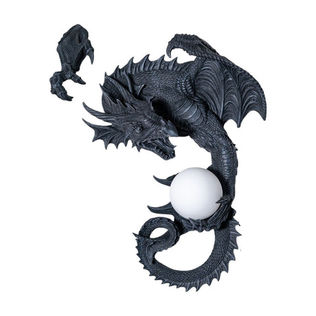 Dark gray faux-stone wall mounted lamp shaped like a dragon with an orb that glows