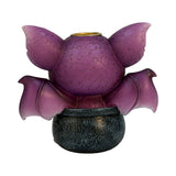 Purple dragon in a cauldron backflow incense cone burner, shown from the back