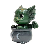 Figurine, green dragon in black cauldron with moon designs