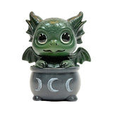 Figurine, green dragon in black cauldron with moon designs