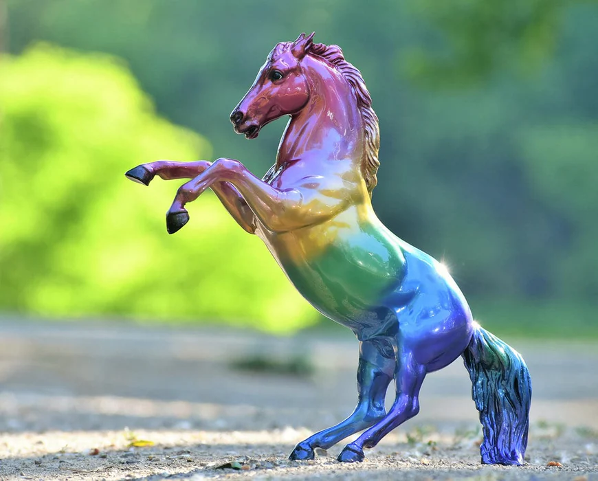 Rainbow colored rearing Breyer model horse - Jewels, 2022 Decorator model