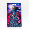 Luggage tag with a fantasy design of a grim reaper on a dragon against a colorful sky.