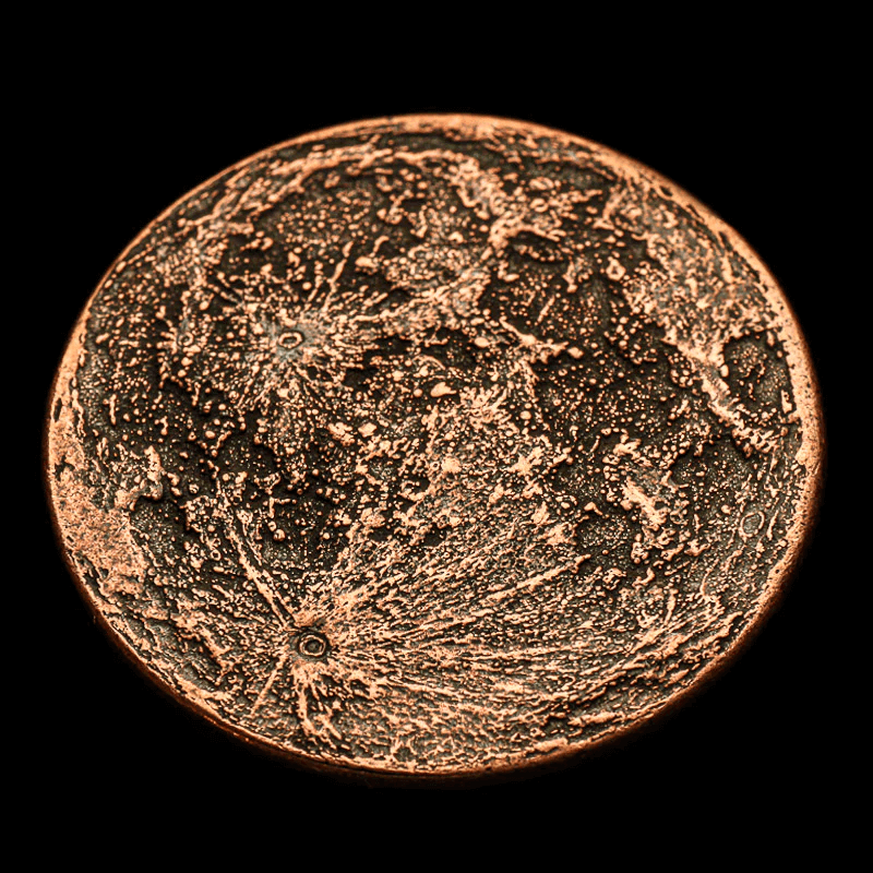 Aztec worry coin, moon side in copper