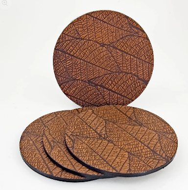 Leather coasters with fallen leaves design in saddle brown