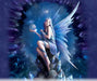 Anne Stokes Stargazer artwork showing a fairy with blue dress and wings holding an orb. Galaxies are visible through the crystal frame and she sits on a mound with more gems.