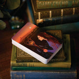 Avalon Visions oracle deck , card deck shown on books