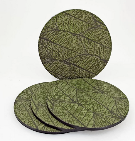 Leather coasters with fallen leaves design in Fern green