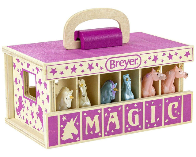 Breyer toy horse carrier with unicorn figurines, "MAGIC" written across the front, pink on wood