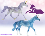 Breyer Unicorn Foal Surprise toy set set with two adult unicorns and hidden foal figurine. Shown models are lavender and blue, the Enchanted Family