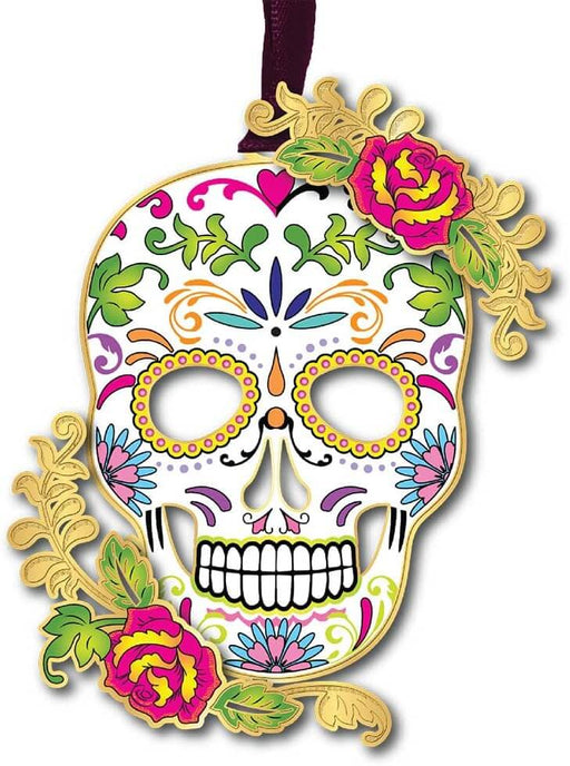 Colorful sugar skull skeleton ornament with red flowers and swirl designs and leaves