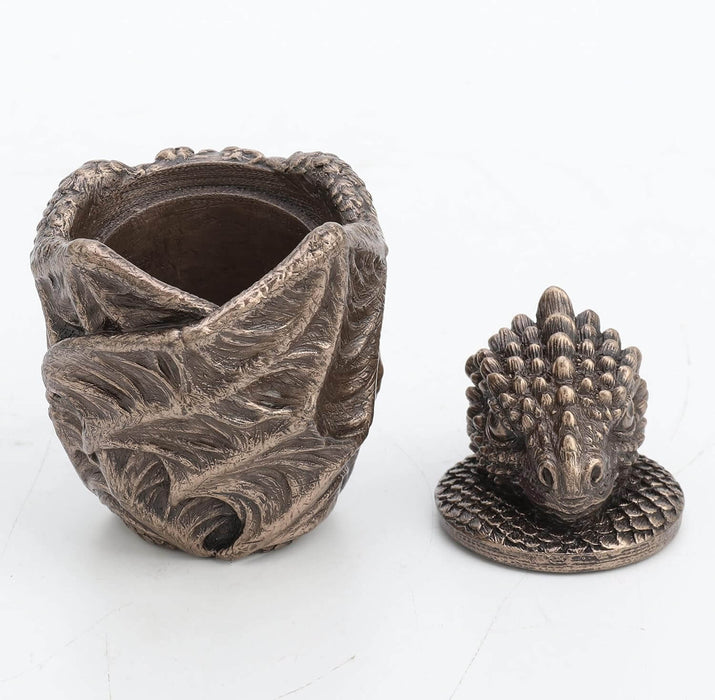 Bronze baby dragon trinket box with wings wrapped around, lid off