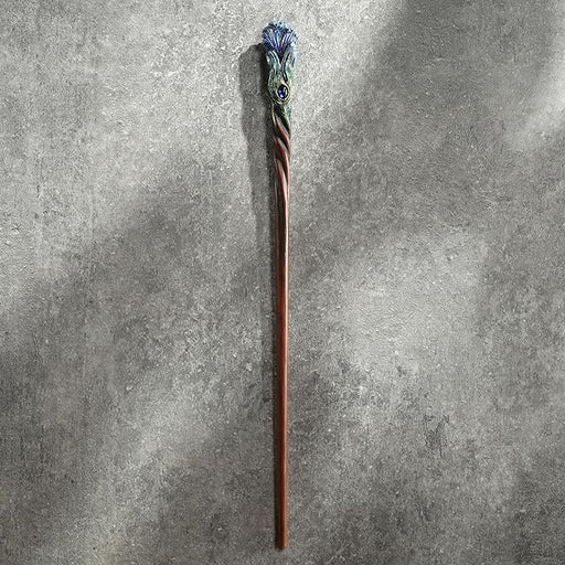 Blue peacock feather wand with gem