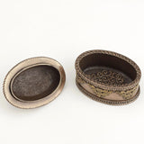 Decorative bronze box with intricate patterns