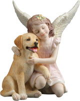 Statue of a girl with angel wings hugging a dog 
