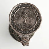 One side of hourglass with dryad tree spirit design