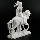 Sculpture of Lady Godiva riding a horse in the nude, clothed in her hair