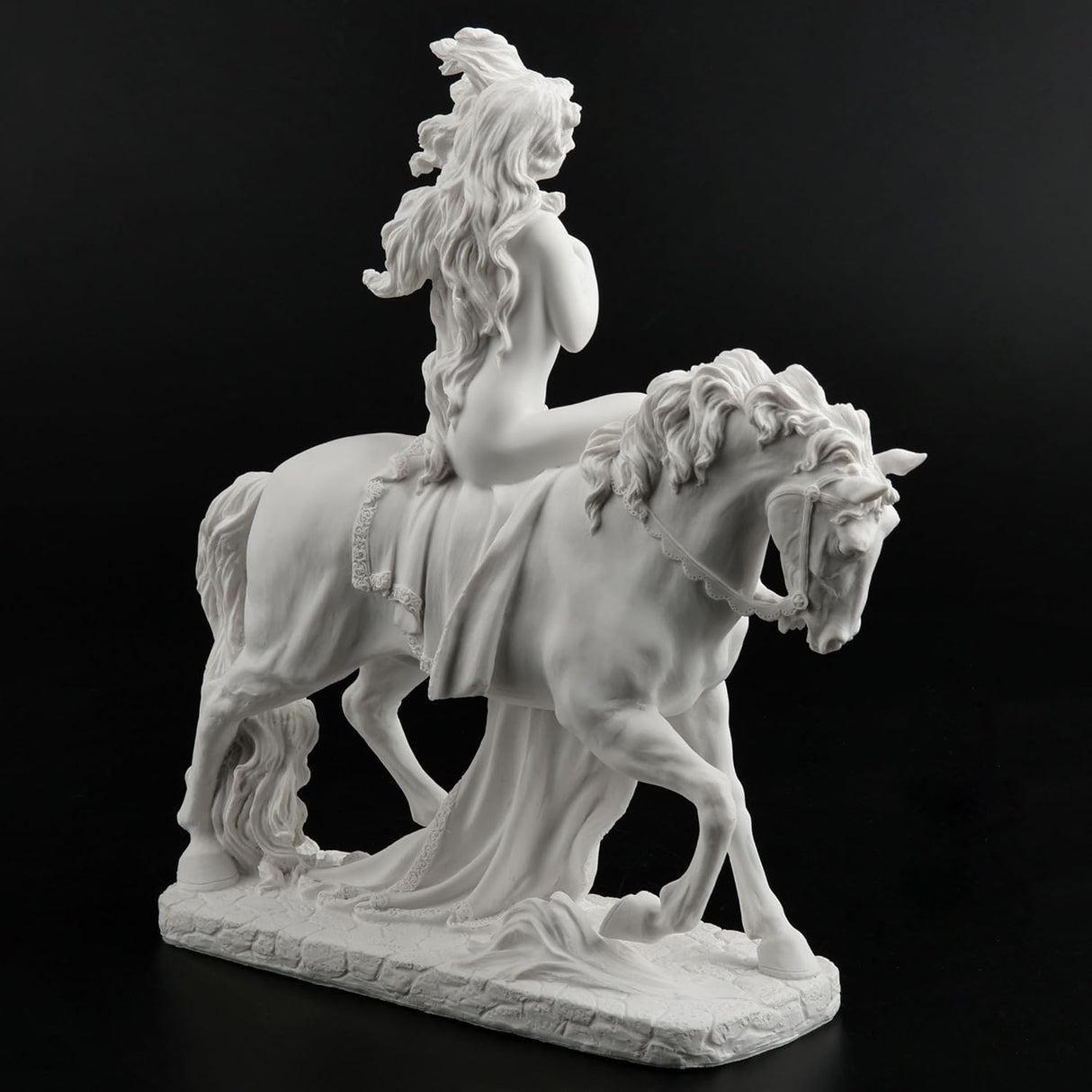 Sculpture of Lady Godiva riding a horse in the nude, clothed in her hair