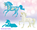 Breyer Unicorn Foal Surprise toy set set with two adult unicorns and hidden foal figurine. Shown models are a blue pinto and a white one, set is the Windswept Family
